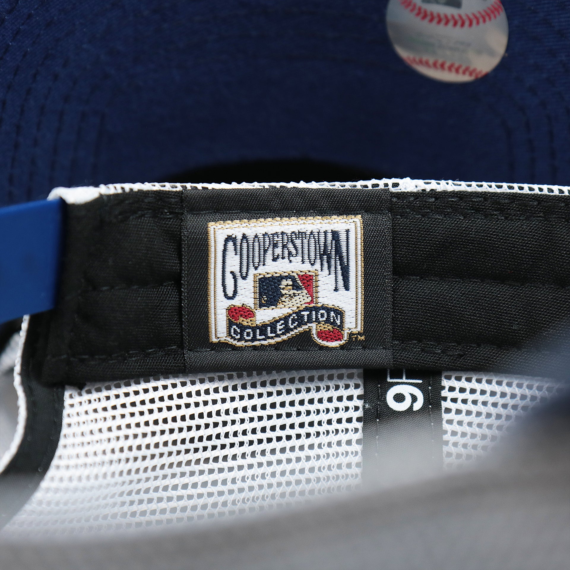 The Cooperstown Collection Tag on the Cooperstown Brooklyn Dodgers 1947s Logo Worn Colorway Mesh Back 9Forty Dad Hat | Royal Blue 9Forty Hat