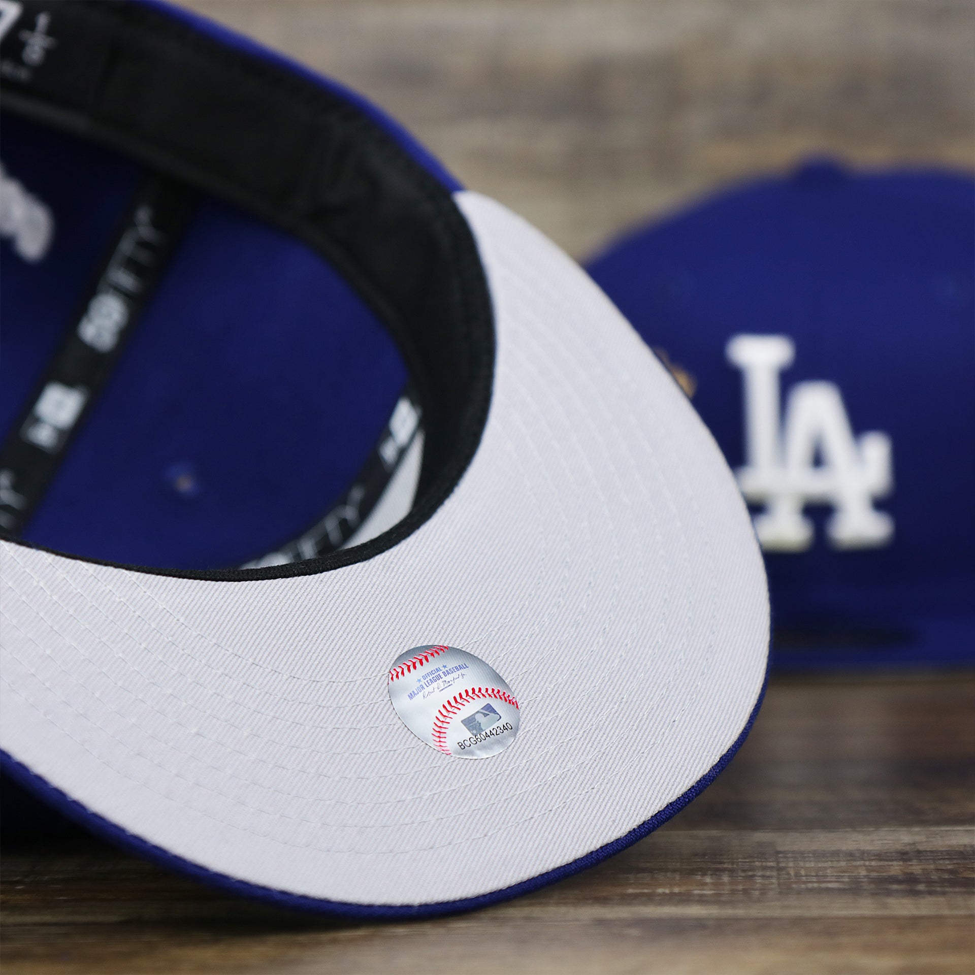 The undervisor on the Los Angeles Dodgers Crown Champions Gray Bottom World Championship Wins Embroidered Fitted Cap | Royal Blue 59Fifty Cap
