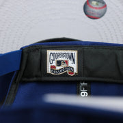 cooperstown logo on the inside of the Brooklyn Dodgers Cooperstown Royal Blue 9Fifty Snapback Cap | OSFM