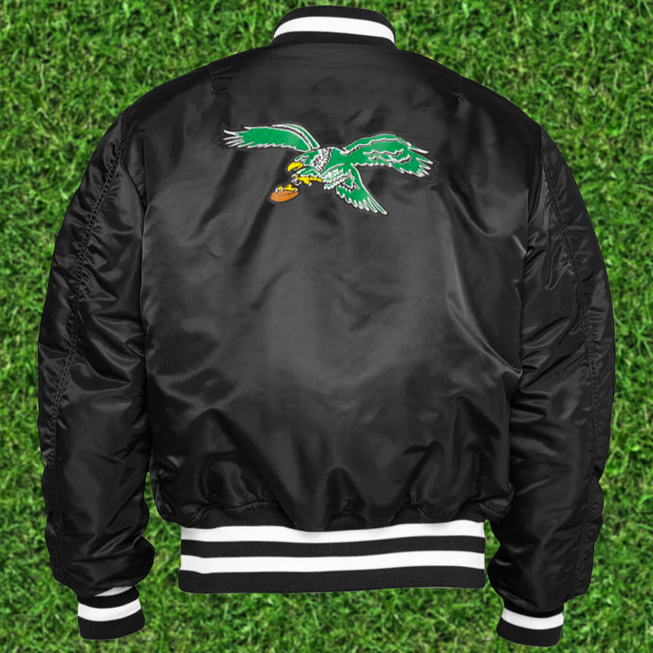 Back of the Philadelphia Eagles Throwback Men’s Vintage Reversible Bomber Jacket | Alpha Industries x New Era