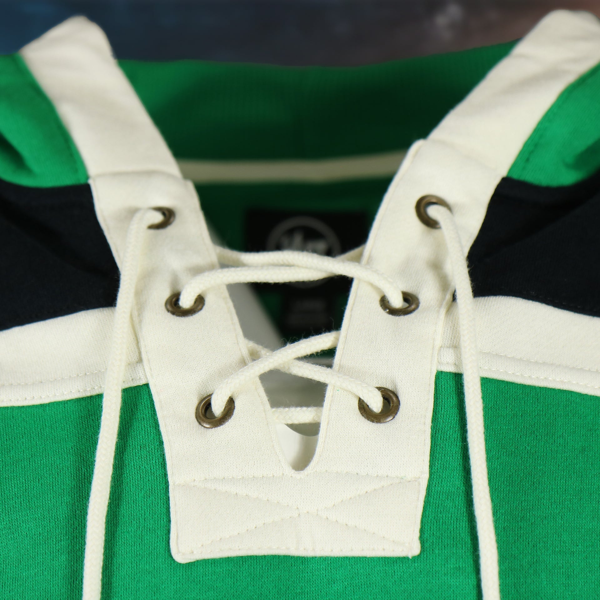 laces on the Philadelphia Eagles Vintage Hockey 47 Lacer Hoodie |  Black, Kelly Green, White