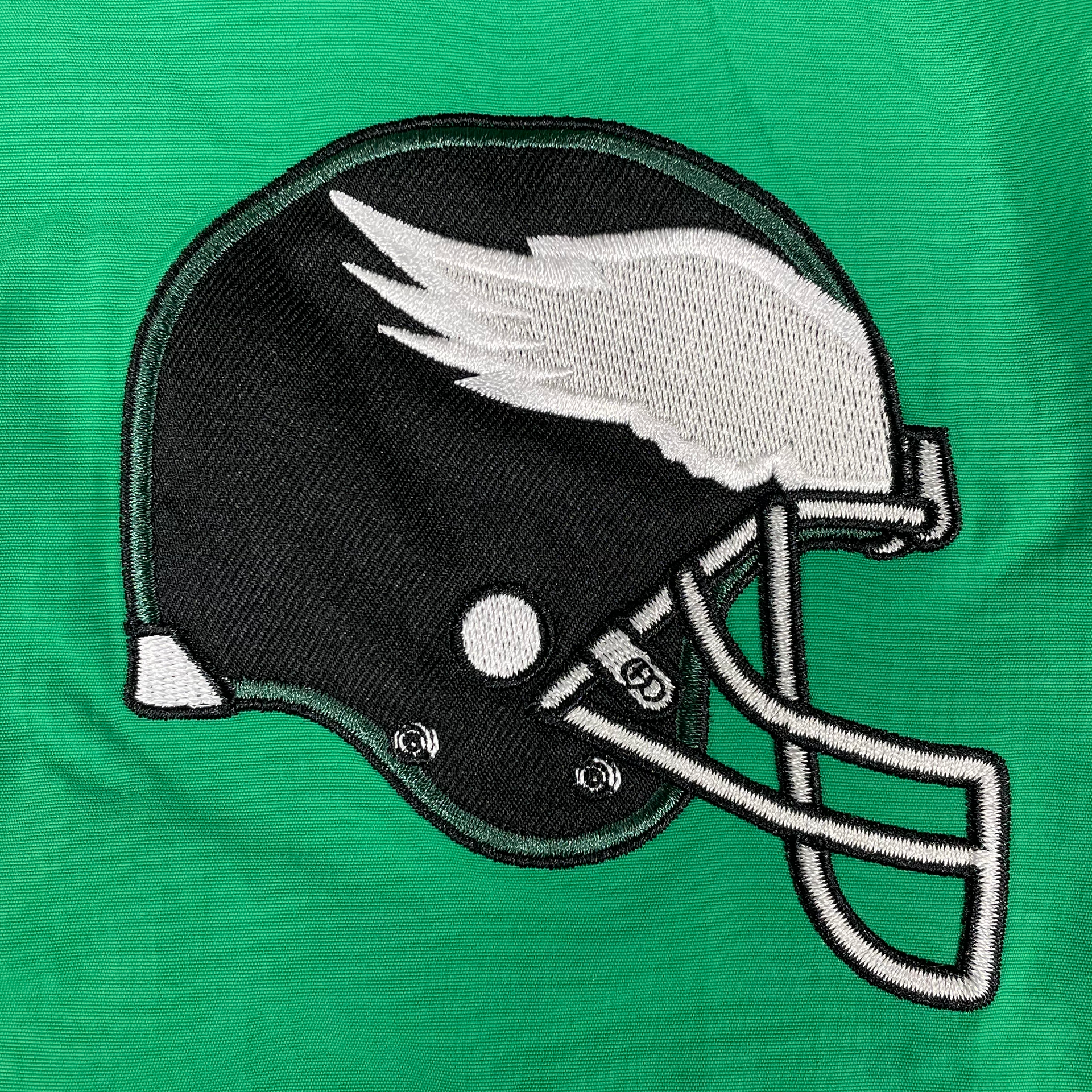 Helmet patch on the Philadelphia Eagles Throwback Men’s Vintage Varsity Jacket | Kelly Green