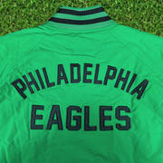 Close up of the back patch on the Philadelphia Eagles Throwback Men’s Vintage Varsity Jacket | Kelly Green
