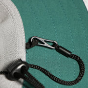 The detachable straps on the Philadelphia Eagles Summer Training Camp Wide Brim Panama Bucket Hat | Distinct Gray Bucket Hat