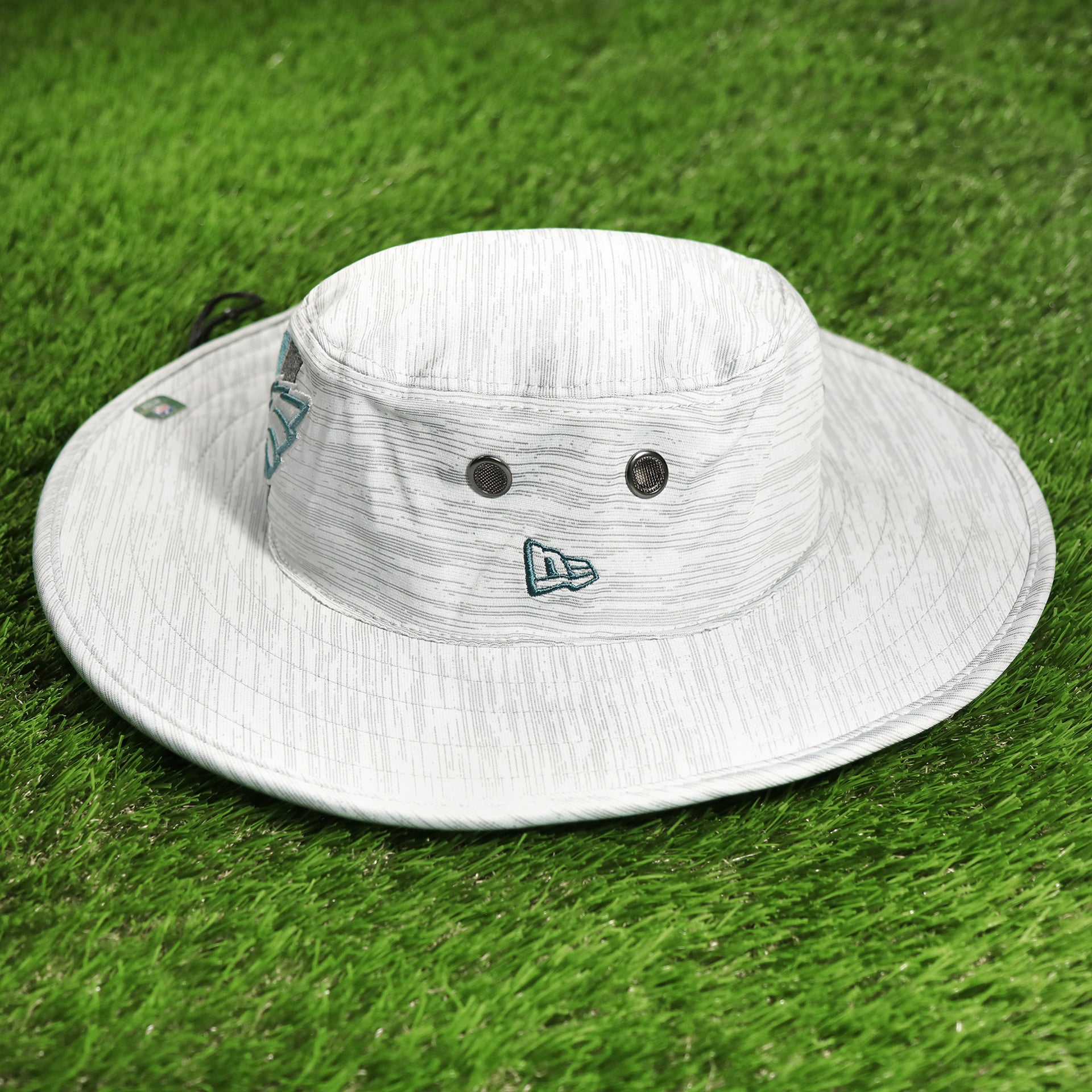 The wearer's left on the Philadelphia Eagles Summer Training Camp Wide Brim Panama Bucket Hat | Distinct Gray Bucket Hat
