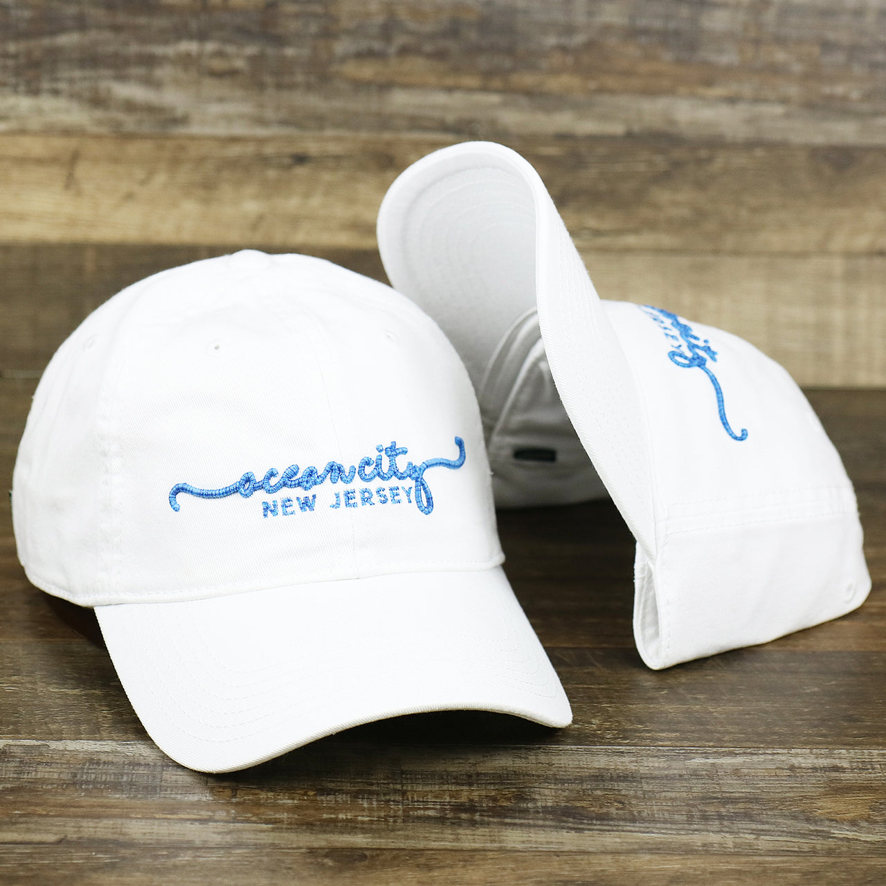 The OCNJ New Jersey Ocean City Cursive Wordmark Dad Hat | White Dad Hat 