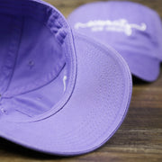 The undervisor on the Ocean City New Jersey Cursive Wordmark Dad Hat | Lavender Dad Hat