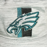 The Eagles Logo on the Philadelphia Eagles Summer Training Camp Short Brim Bucket Hat | Distinct Gray Bucket Hat
