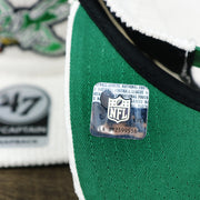 The NFL Sticker on the Throwback Philadelphia Eagles Corduroy Snapback Hat | White Corduroy Snap Cap