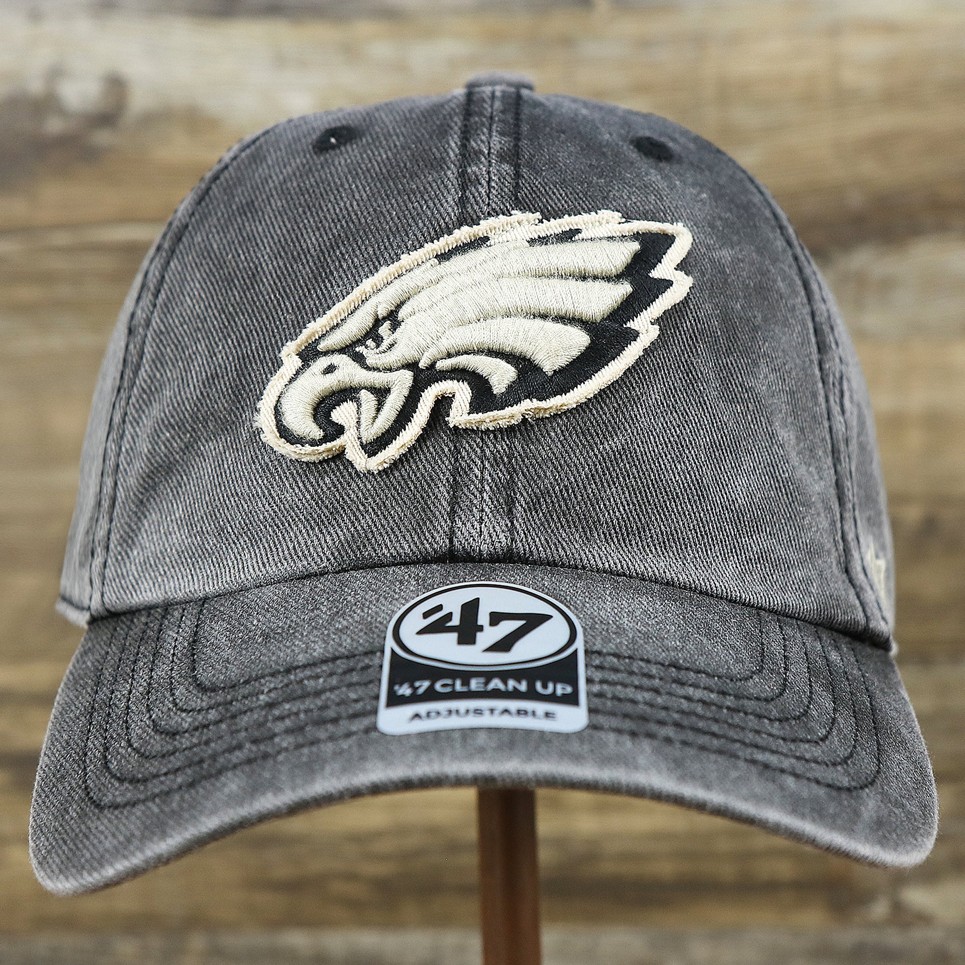 The front of the Philadelphia Eagles Worn Dark Gray Dad Hat | Worn Dark Gray Dad Hat