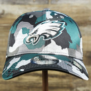 The front of the Philadelphia Eagles Summer Training 2022 Camo 39Thirty FlexFit Cap | Midnight Green Camo 39Thirty Cap