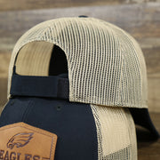 The backside of the Philadelphia Eagles Leather Patch Mesh Back Trucker Hat | Black Trucker Hat