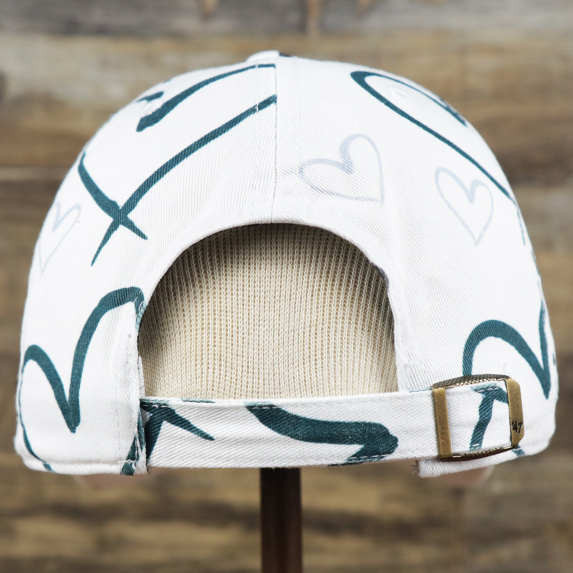 The backside of the Kids Philadelphia Eagles Hearts All Over Print Dad Hat | White Kid’s Dad Hat