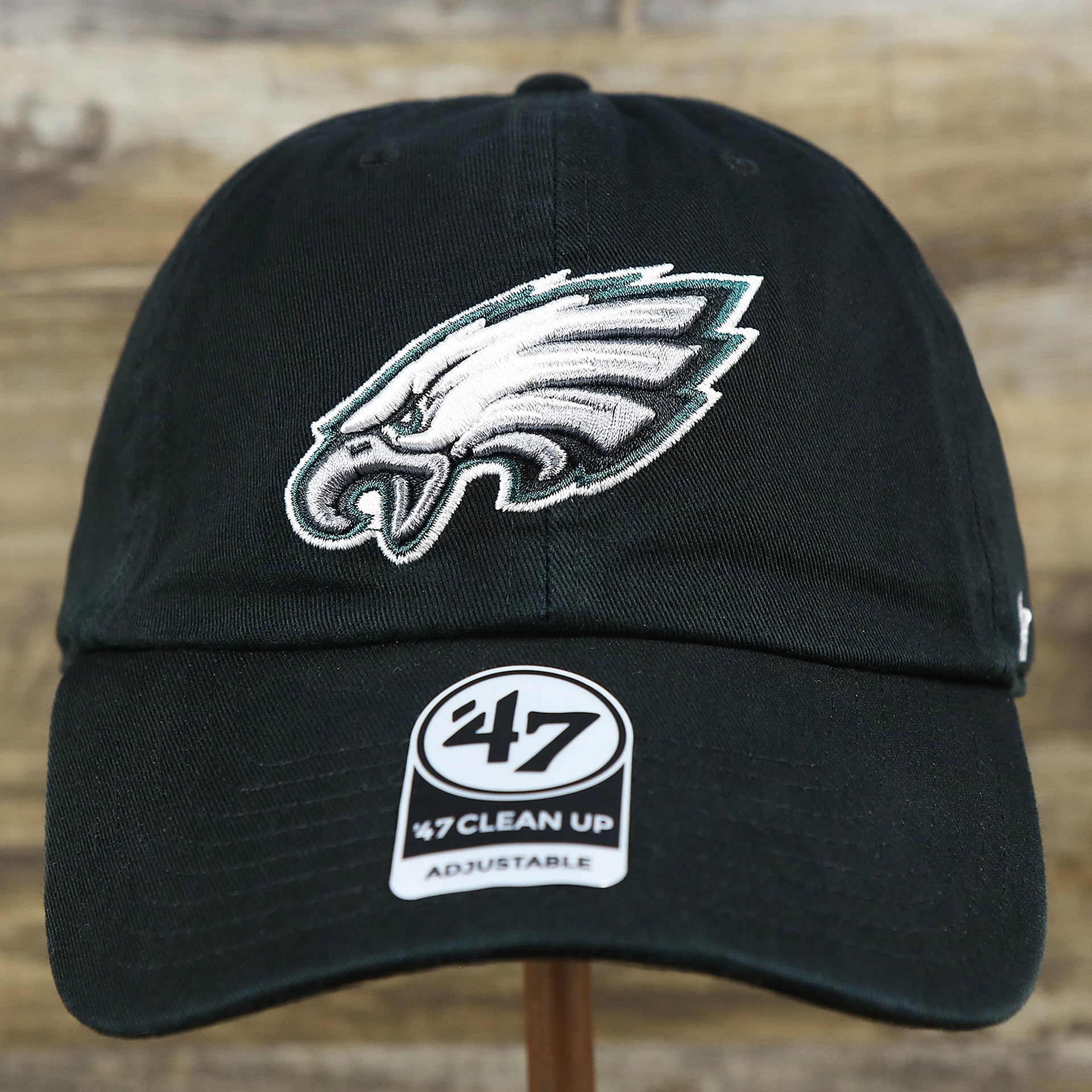 The front of the Philadelphia Eagles Logo Adjustable Dad Hat | Black Dad Hat