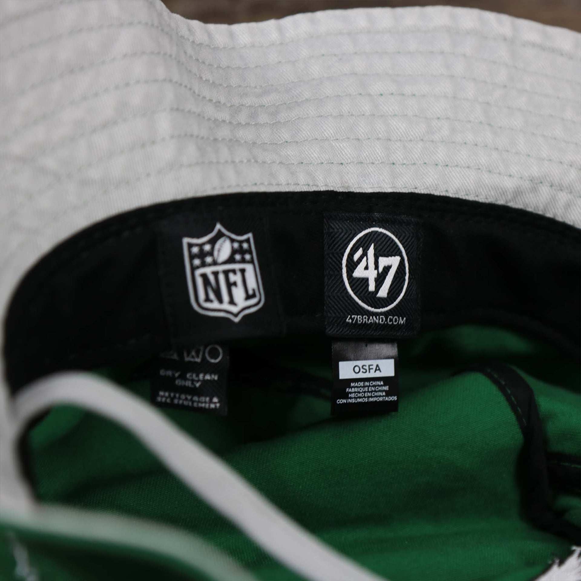 The tags on the Throwback Philadelphia Eagles Vintage Bucket Hat | 47 Brand, Kelly Green
