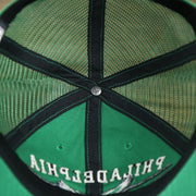 The inside of the Throwback Philadelphia Eagles Legacy Logo Highpoint Mesh Back Dad Hat | Mesh Back Kelly Green Dad Hat