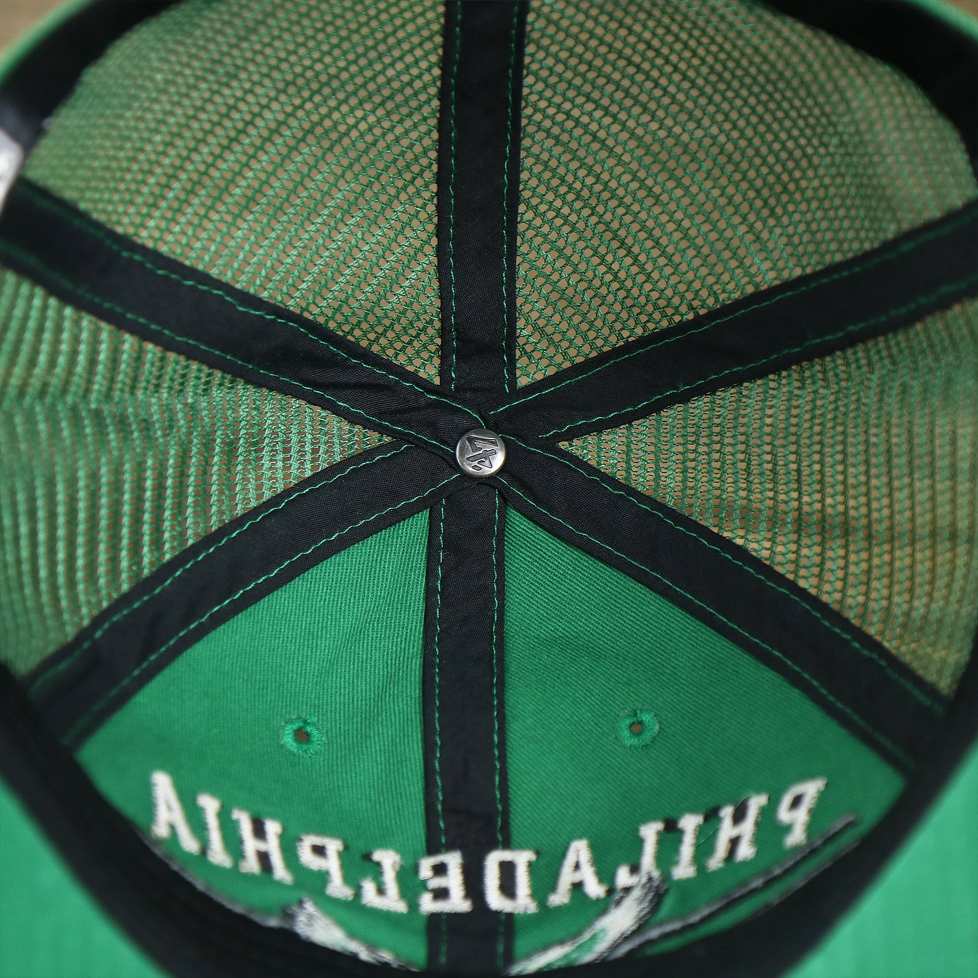 The inside of the Throwback Philadelphia Eagles Legacy Logo Highpoint Mesh Back Dad Hat | Mesh Back Kelly Green Dad Hat