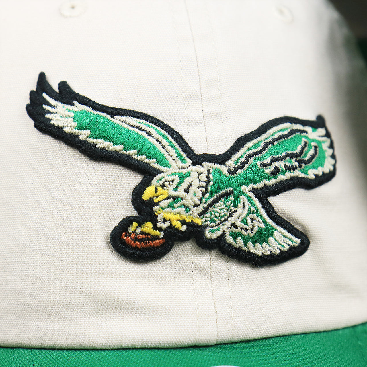 The Eagles Logo on the Throwback Philadelphia Eagles Embroidered 1987 Eagles Logo NFL Eagles Side Patch Dad Hat | Bone Dad Hat