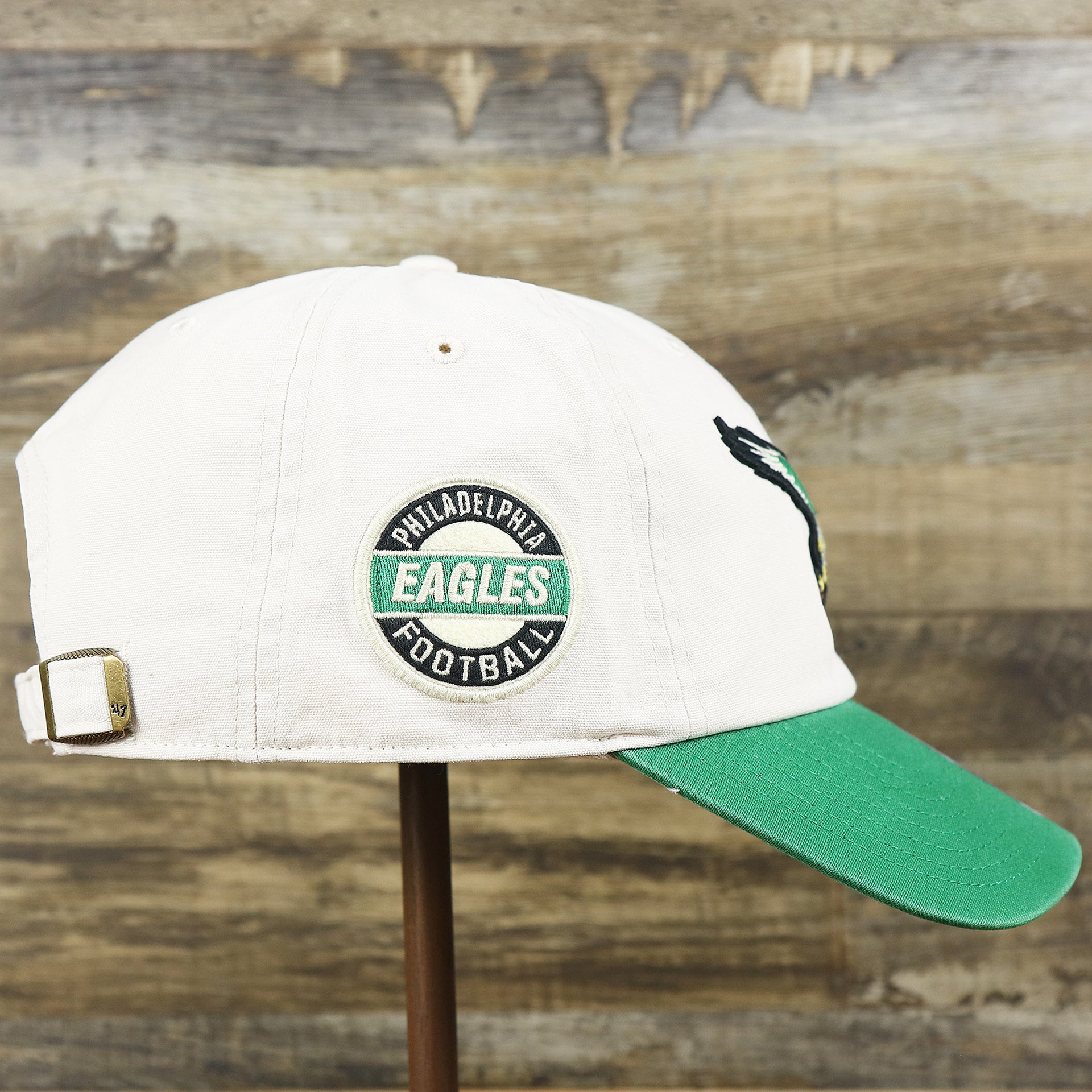 The wearer's right on the Throwback Philadelphia Eagles Embroidered 1987 Eagles Logo NFL Eagles Side Patch Dad Hat | Bone Dad Hat