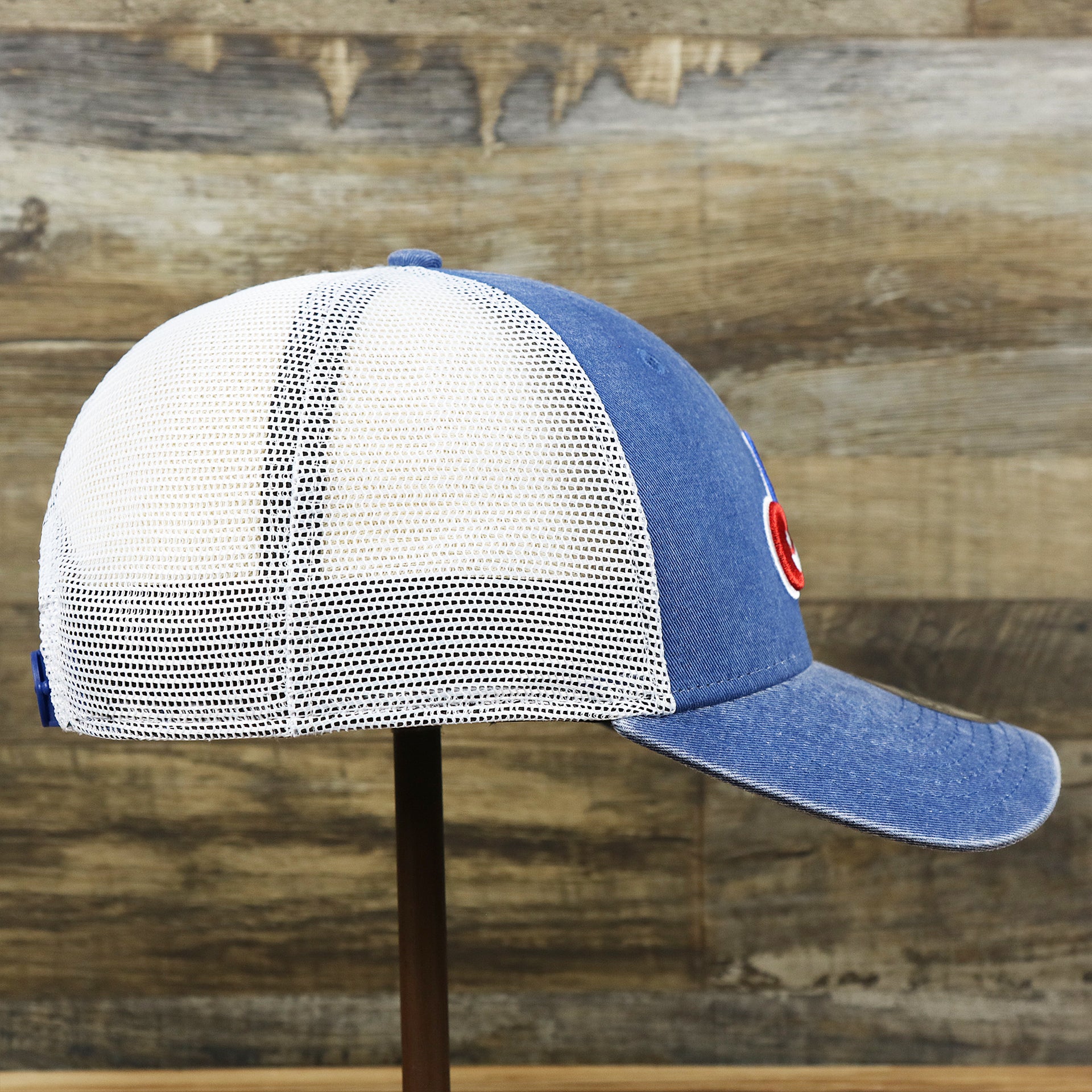 The wearer's right on the Cooperstown Montreal Expos 1969s Logo Worn Colorway Mesh Back 9Forty Dad Hat | Royal Blue 9Forty Hat