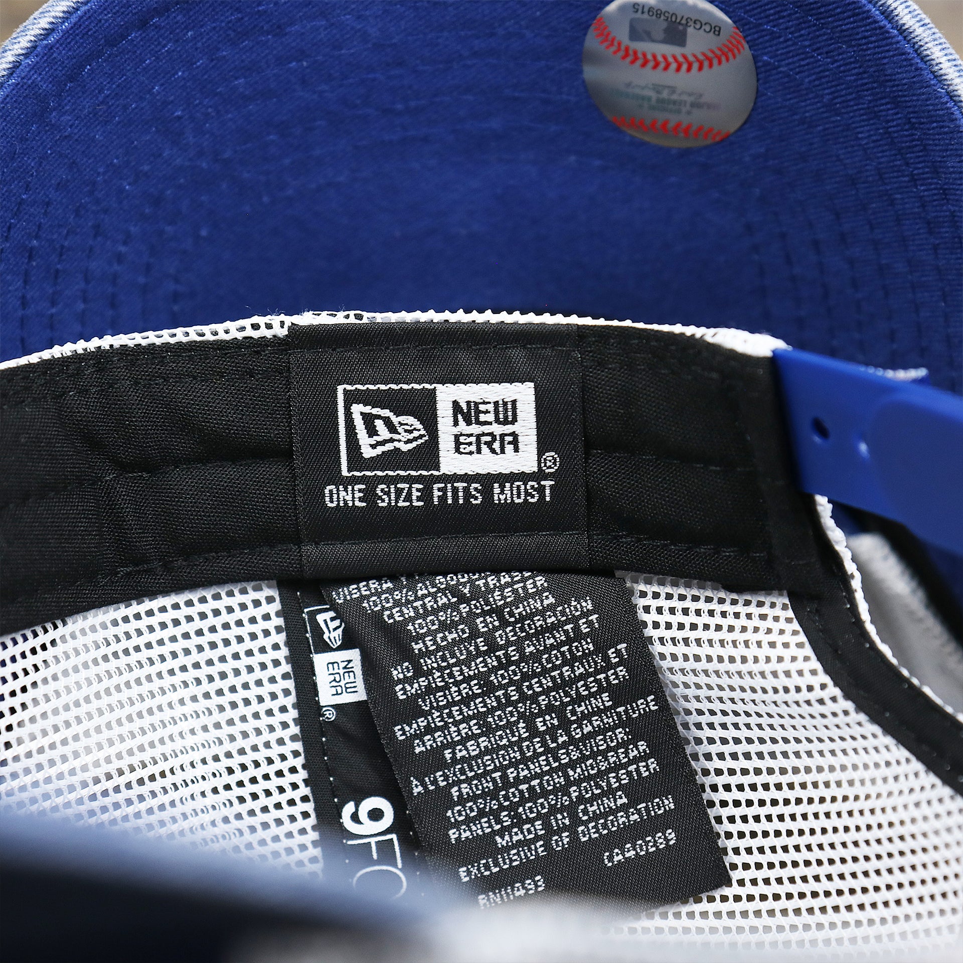The New Era Tag on the Cooperstown Montreal Expos 1969s Logo Worn Colorway Mesh Back 9Forty Dad Hat | Royal Blue 9Forty Hat