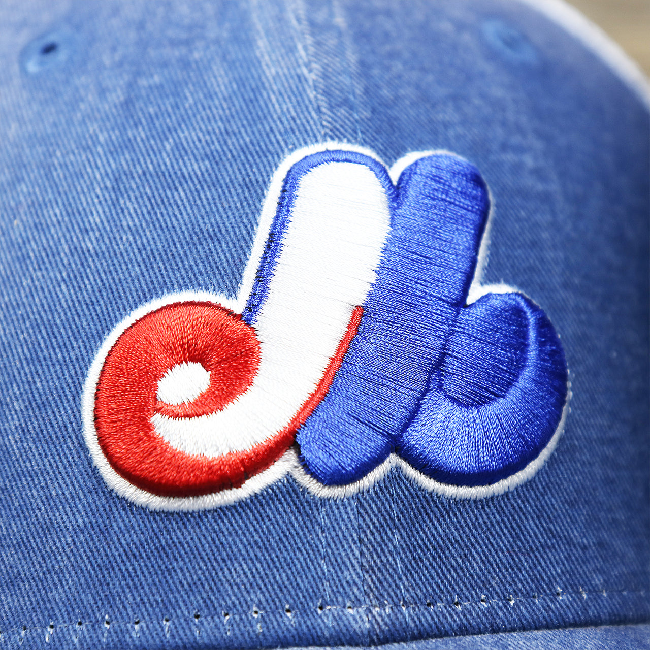 The Retro Expos Logo on the Cooperstown Montreal Expos 1969s Logo Worn Colorway Mesh Back 9Forty Dad Hat | Royal Blue 9Forty Hat