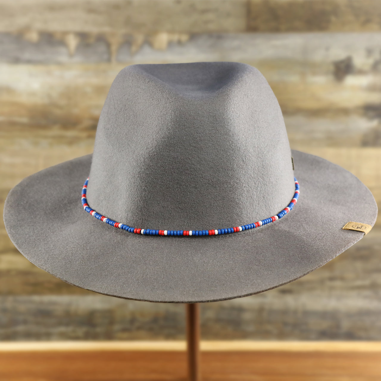 The front of the Philadelphia 76ers Beaded Wide Brim Fedora Hat With Metal New Era Logo | Gray Fedora Hat