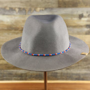 The front of the Philadelphia 76ers Beaded Wide Brim Fedora Hat With Metal New Era Logo | Gray Fedora Hat