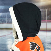 Side of the hood on the Philadelphia Flyers Premium Applique Black/Orange/Cream Lacer Hoodie