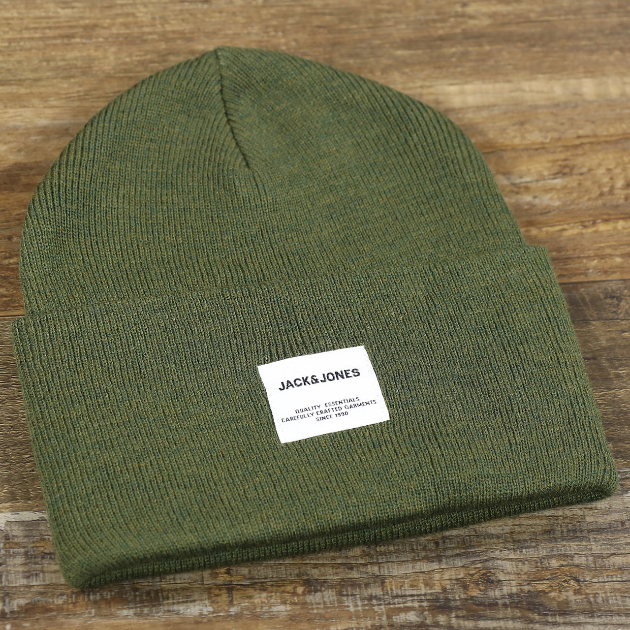 The front of the Jack And Jones Forest Night High Cuff Knit Beanie | Dark Green Knit Beanie