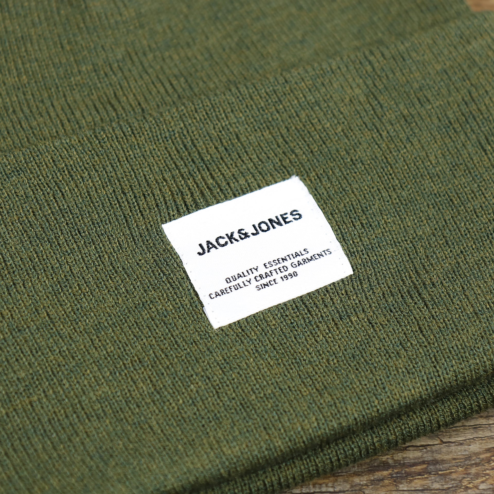 The Jack and Jones tag on the Jack And Jones Forest Night High Cuff Knit Beanie | Dark Green Knit Beanie