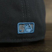 A close up of the MLB Batterman logo on the Philadelphia Phillies 2022 Father's Day On-Field 59Fifty Fitted Cap | Gray