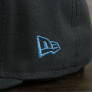A close up of the New Era logo on the Philadelphia Phillies 2022 Father's Day On-Field 59Fifty Fitted Cap | Gray