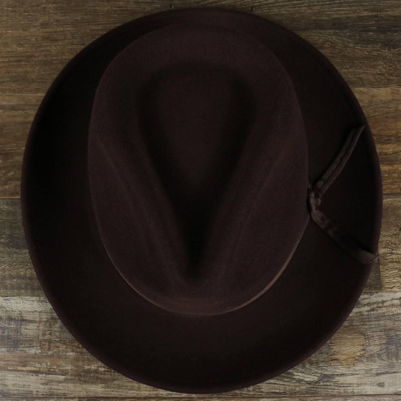 an overhead view of the Can Can Australian Wool Small Brim Folded Edge Fedora Hat with Brown Silk Interior | Brown