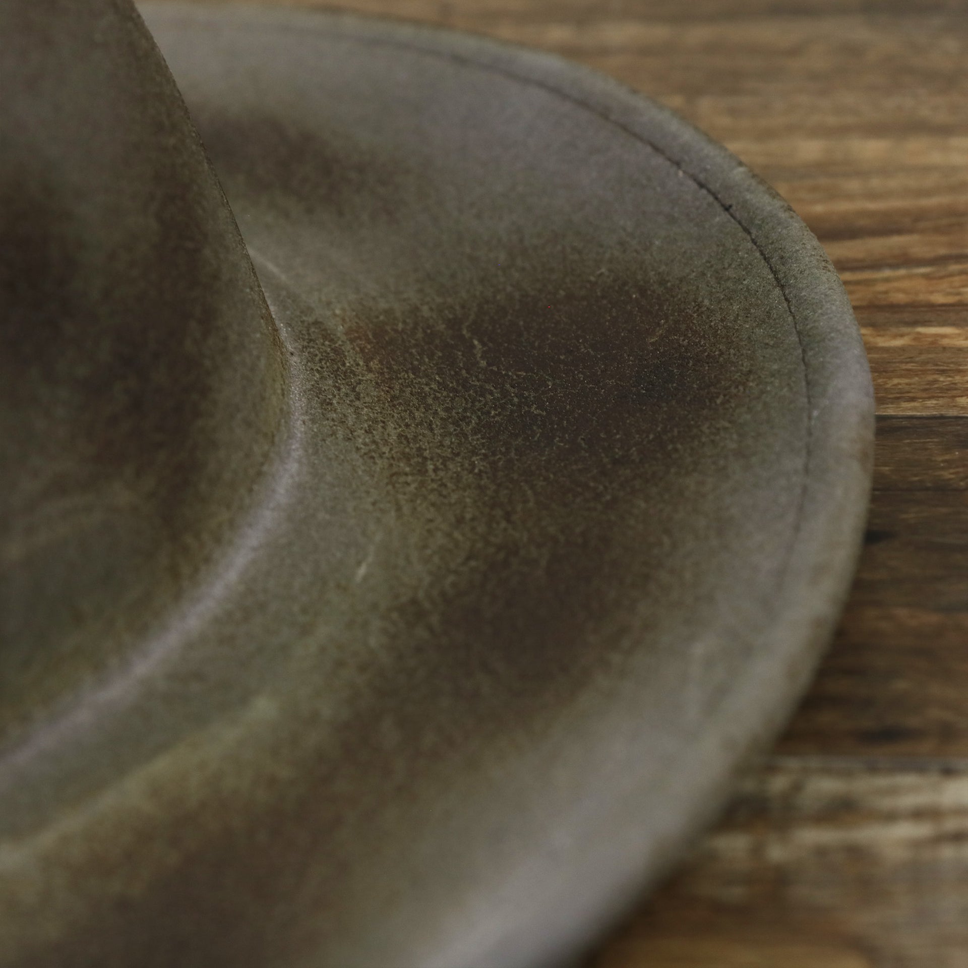The brim on the Wide Brim Ribbon Edge Chared Fedora Hat with Brown Paisley Silk Interior | Zertrue 100% Australian Wool