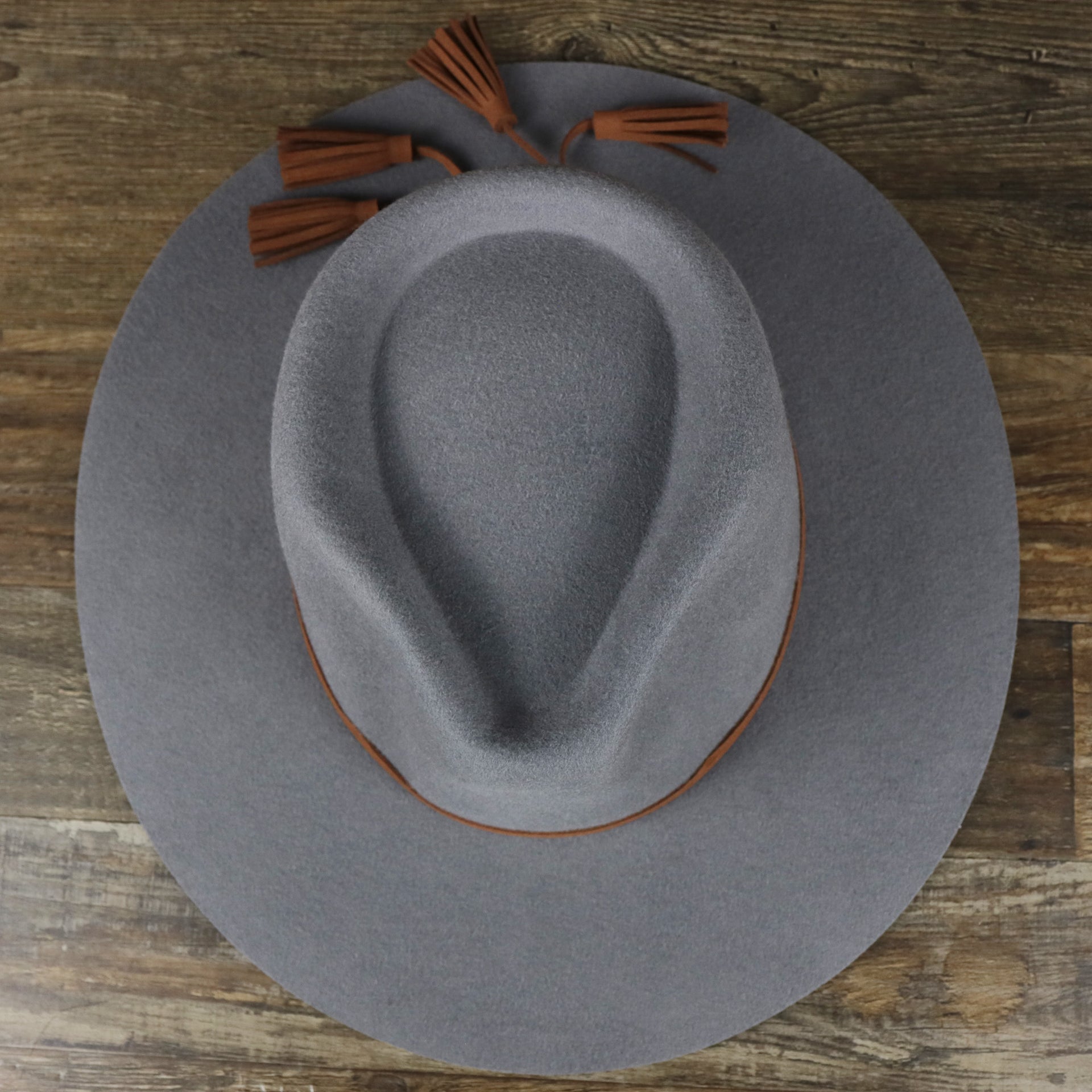 An overhead view of the Wide Brim Raw Edge Gray Fedora Hat with Black Silk Interior | Zertrue 100% Australian Wool