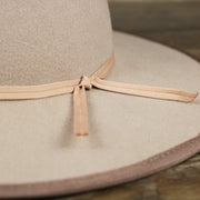 A close up of the ribbon on the Wide Brim Ribbon Edge Taupe Fedora Hat with Brown Paisley Silk Interior | Zertrue 100% Australian Wool