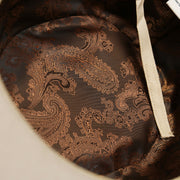 The interior of the Wide Brim Ribbon Edge Taupe Fedora Hat with Brown Paisley Silk Interior | Zertrue 100% Australian Wool