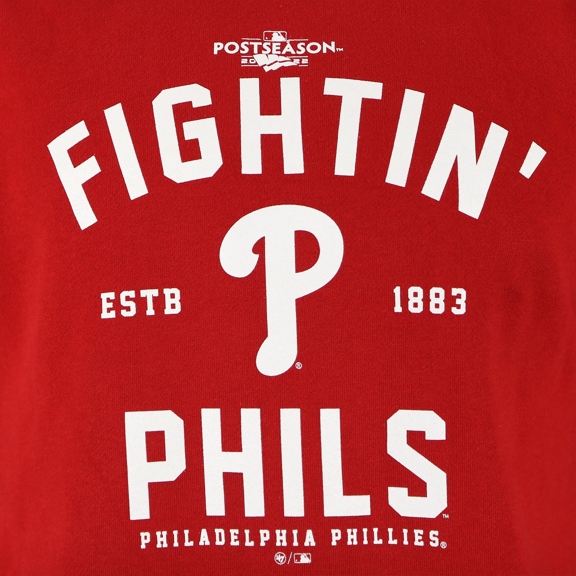Phillies P logo, the words Fightin Phils, the year the team was established, and the postseason logo on the Philadelphia Phillies 2022 World Series Fightin' Phils Pullover Hoodie | 47 Brand, Red