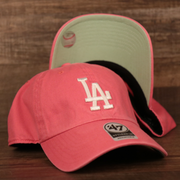 Top and bottom view of this pink adjustable Los Angeles Dodgers green bottom dad hat.