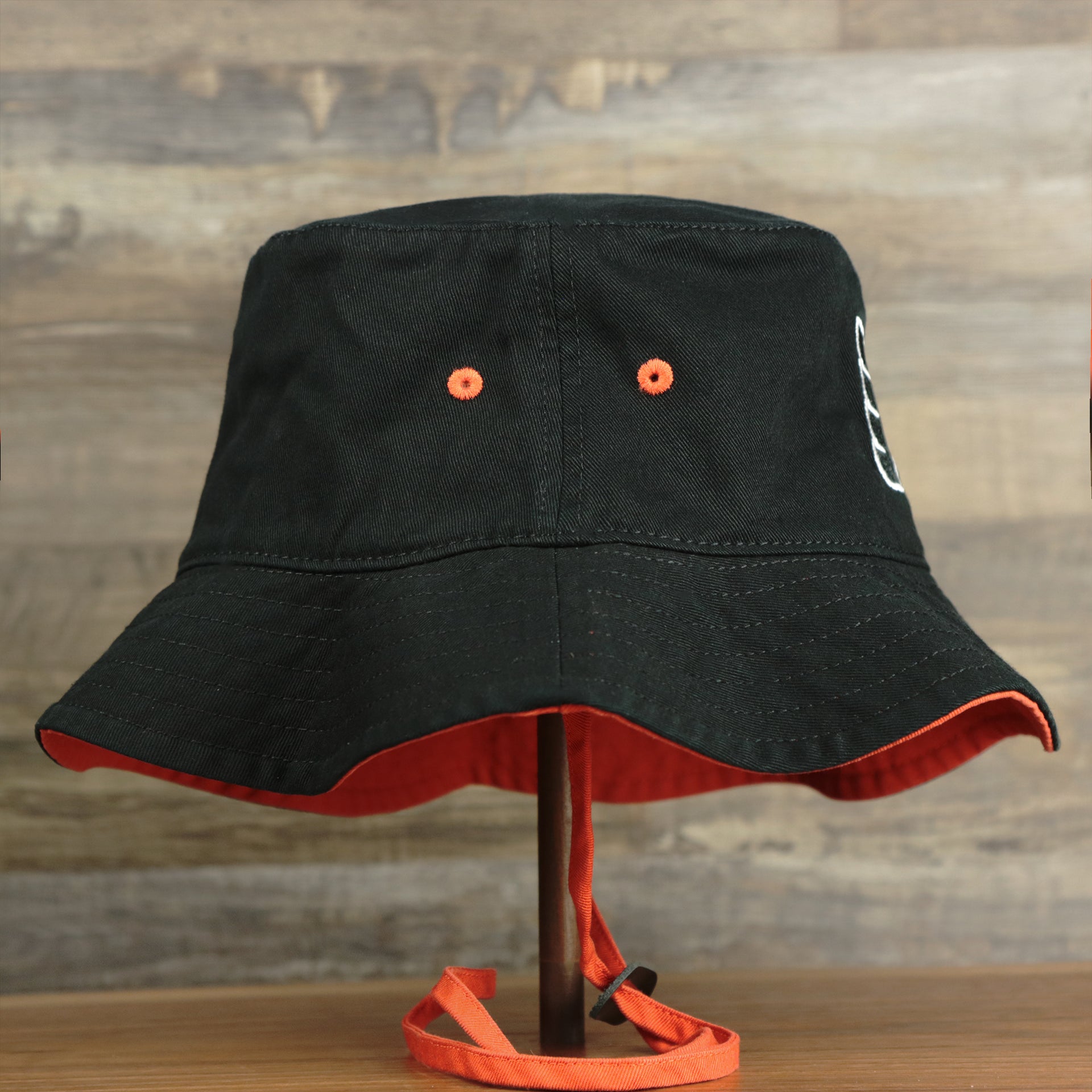 The wearer's right on the Philadelphia Flyers Logo Orange Undervisor Bucket Hat | Black Bucket Hat