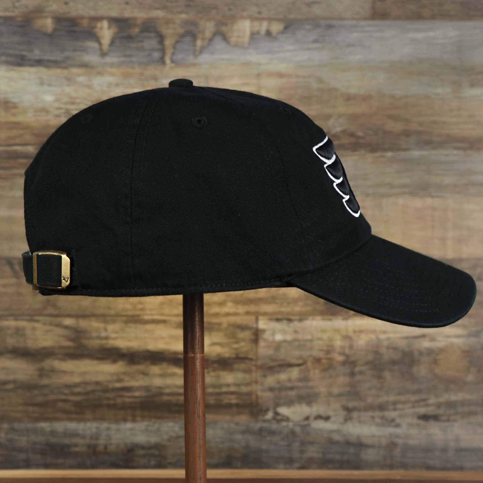 The wearer's right on the Philadelphia Flyers Black Dad Hat | 47 Brand OSFM
