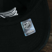 The Official NHL Product tag on the Philadelphia Flyers Black Dad Hat | 47 Brand OSFM