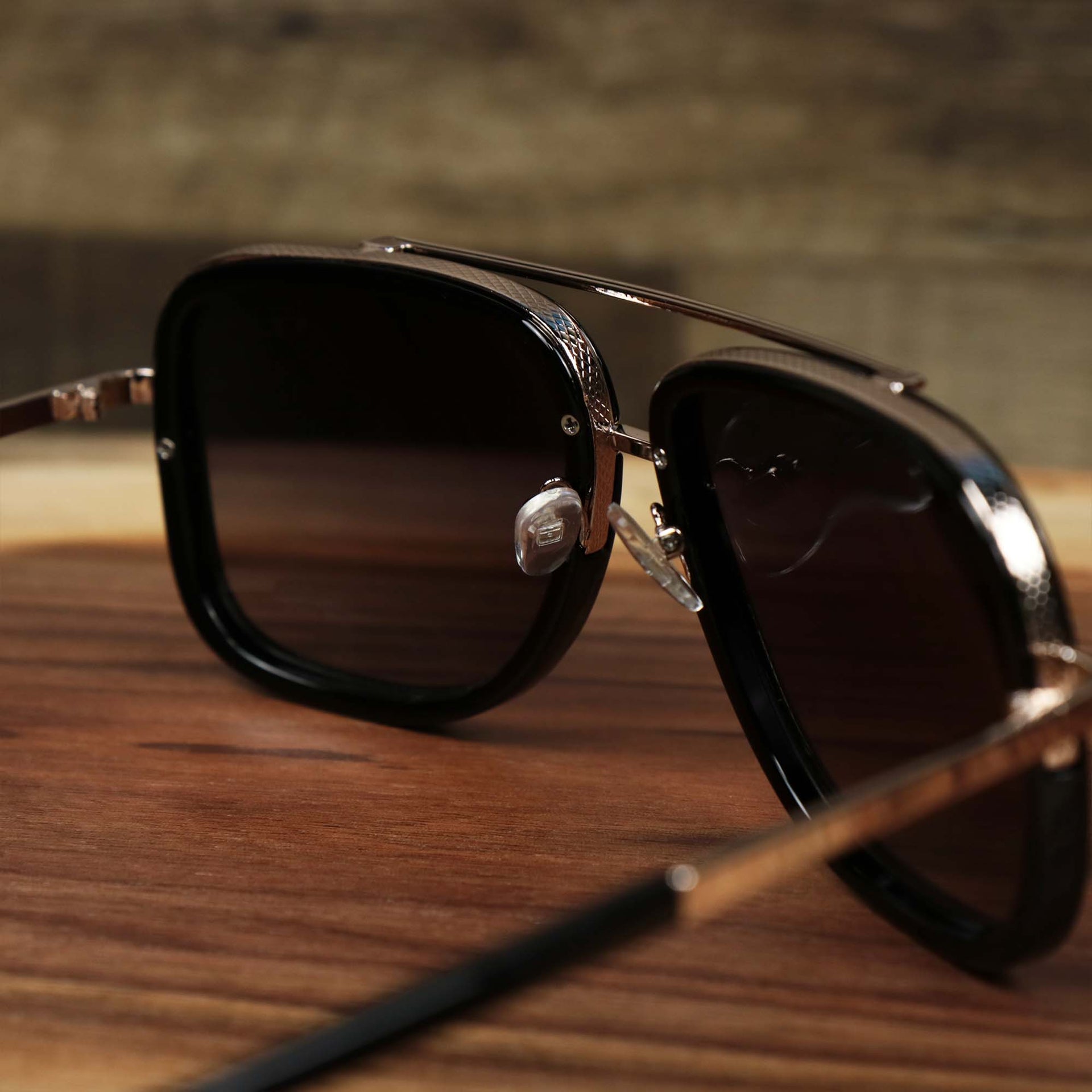 The inside of the Round Frames Black Lens Sunglasses with Black Gold Frame