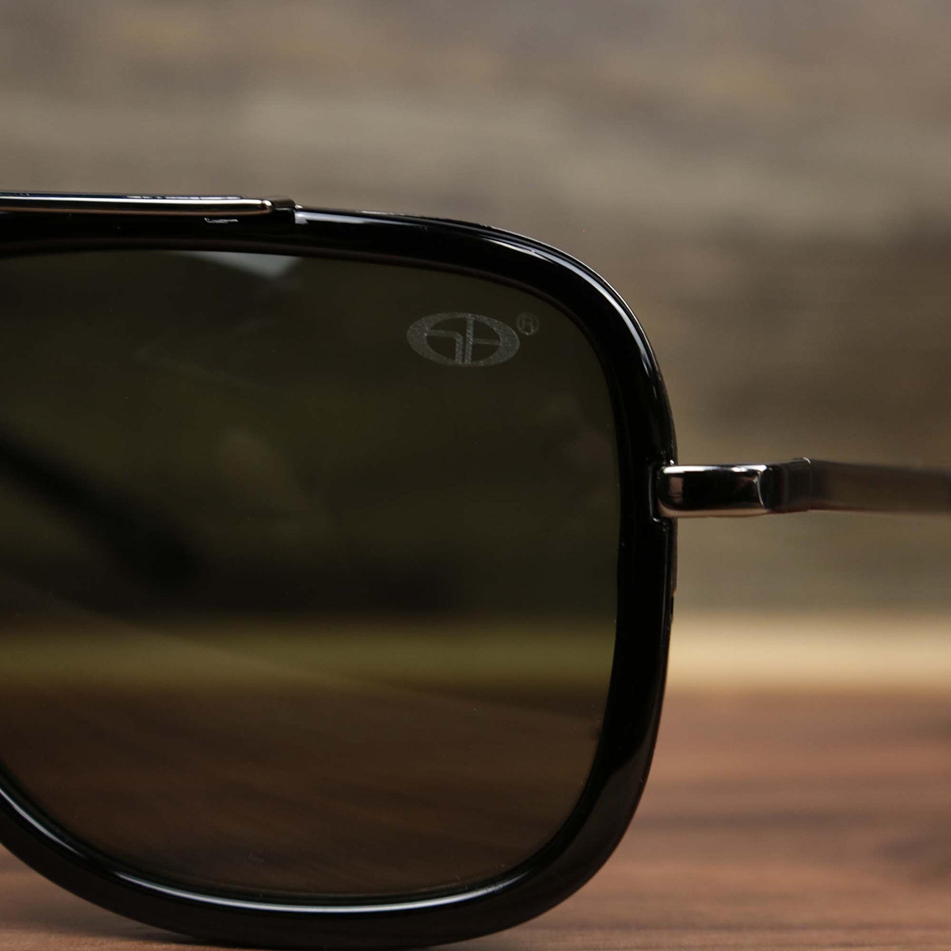 The hinge on the Round Frames Black Lens Sunglasses with Black Silver Frame