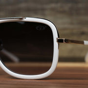 The hinge on the Round Frame Black Lens Luxury Sunglasses with White Gold Frame