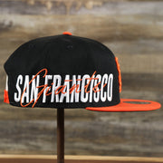 The wearer's right on the San Francisco Giants MLB Side Font Green Bottom 9Fifty Snapback Cap | Black Snap Cap