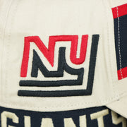 The Giants Vintage Patch on the Throwback New York Giants Striped Wordmark Legacy Giants Side Patch Crossroad Dad Hat | Bone Dad Hat