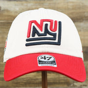 The front of the Throwback New York Giants Embroidered 1975 Giants Logo NFL Giants Side Patch Dad Hat | Bone Dad Hat