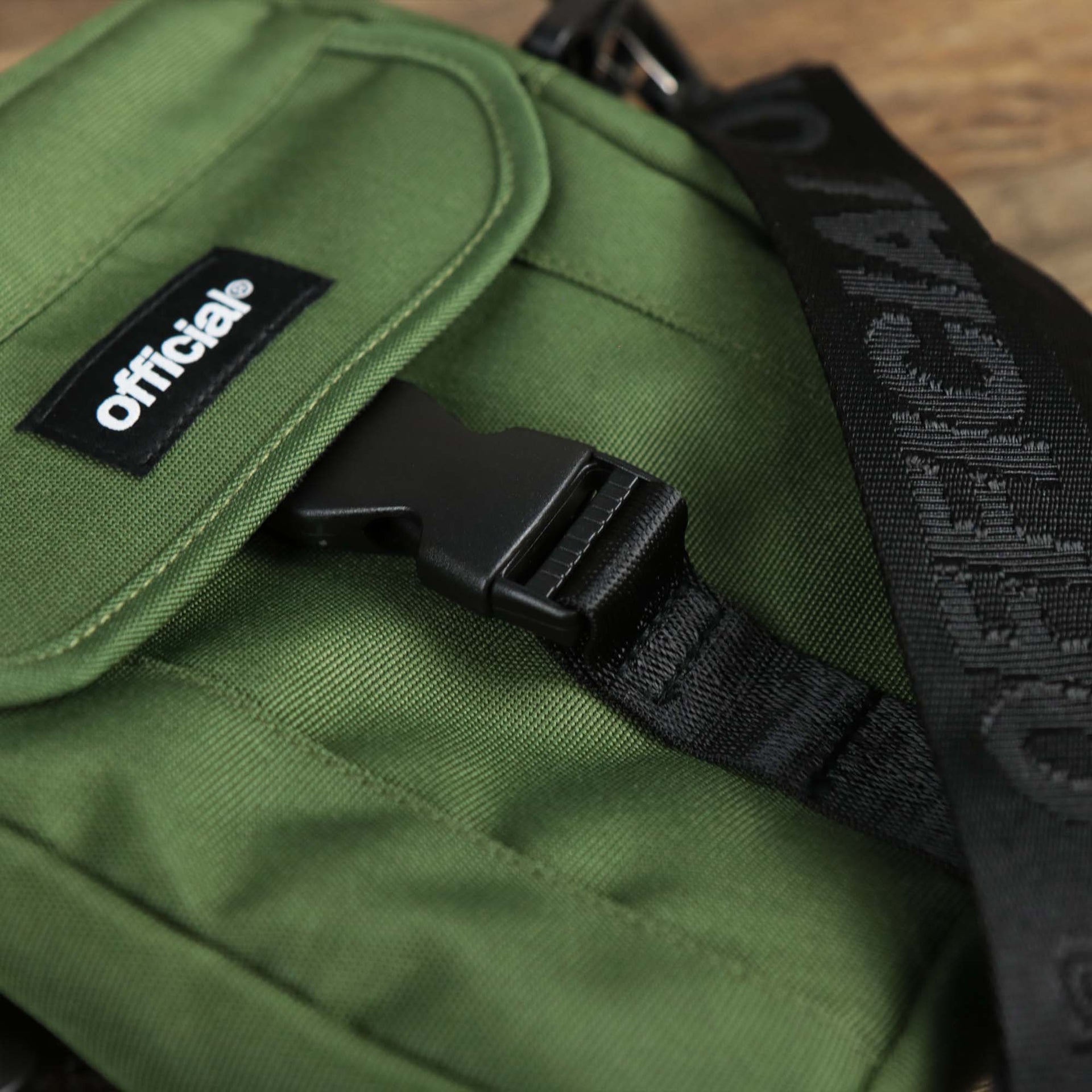 The clasp on the Essential Nylon Shoulder Bag Streetwear with Mesh Pocket | Official Olive